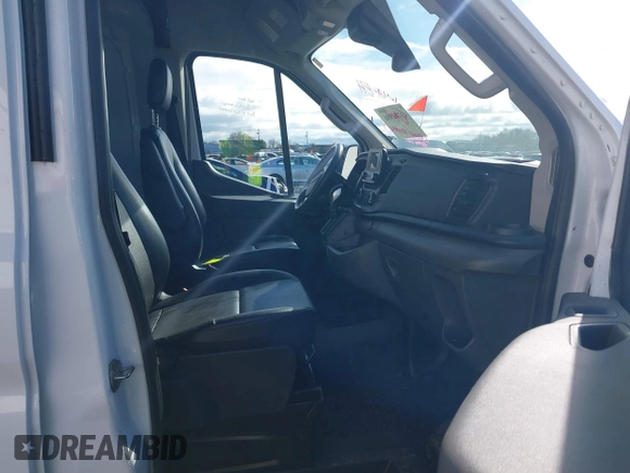 2023 Ford Transit Cargo with VIN 1FTBR3U88PKA07731, listed as a IAAI auction lot 41781986 with 37,044 mi miles and . Bid and sale history available at DreamBid. Image 5.