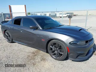 2019 Dodge Charger Scat Pack z VIN 2C3CDXGJ2KH506831, wystawiony jako IAAI lot #40080866 z przebiegiem 95 175 mil mil oraz . Historia ofert i sprzedaży dostępna na DreamBid. Obrazek 1.