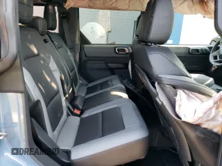 2024 Ford Bronco Black Diamond z VIN 1FMDE1BH2RLA55715, wystawiony jako Copart lot #69823114 z przebiegiem 1 476 mil mil oraz Szkoda całkowita • Salvage title. Historia ofert i sprzedaży dostępna na DreamBid. Obrazek 11.