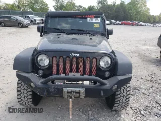 2014 Jeep Wrangler Unlimited Rubicon with VIN 1C4BJWFGXEL291187, listed as a Copart auction lot 54897675 with 227,478 mi miles and Salvage title. Bid and sale history available at DreamBid. Image 5.