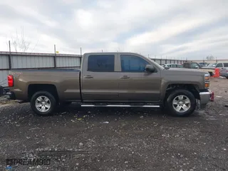 2015 Chevrolet Silverado 1500 LT with VIN 3GCUKRECXFG169272, listed as a IAAI auction lot 41449120 with 184,170 mi miles. Bid and sale history available at carsss.com. Image 14.