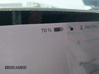 2021 Tesla Model 3 Standard Range Plus z VIN 5YJ3E1EA8MF100456, wystawiony jako IAAI lot #42100840 z przebiegiem 64 389 mil mil oraz . Historia ofert i sprzedaży dostępna na DreamBid. Obrazek 16.