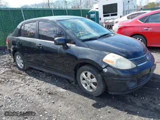 2007 Nissan Versa 1.8 S with VIN 3N1BC11E27L440690, listed as a IAAI auction lot 41832369 with 999,999 mi miles. Bid and sale history available at carsss.com. Image 1.