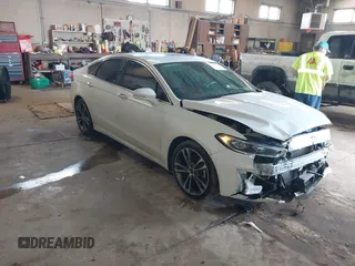 2019 Ford Fusion Titanium with VIN 3FA6P0D92KR153096, listed as a IAAI auction lot 41679393 with 127,292 mi miles and . Bid and sale history available at DreamBid. Image 1.