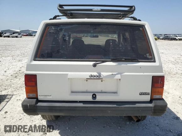 1996 Jeep Cherokee Sport with VIN 1J4FJ68S1TL128597, listed as a Copart auction lot 49600545 with 201,074 mi miles and Salvage title. Bid and sale history available at DreamBid. Image 6.