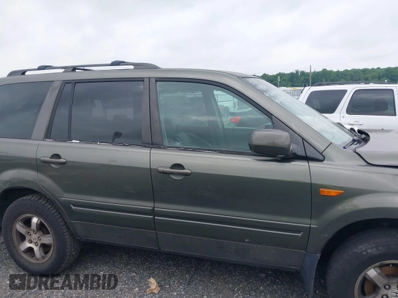 2006 Honda Pilot EX-L with VIN 5FNYF18776B011211, listed as a IAAI auction lot 39555749 with 295,998 mi miles and . Bid and sale history available at DreamBid. Image 14.