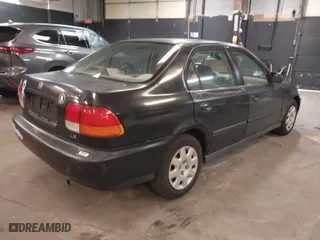 1998 Honda Civic LX with VIN 2HGEJ6679WH557828, listed as a IAAI auction lot 41794170 with 183,558 mi miles. Bid and sale history available at carsss.com. Image 4.
