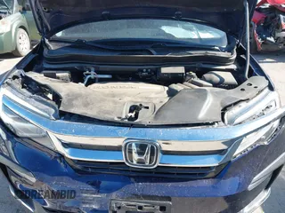 2020 Honda Pilot Elite with VIN 5FNYF6H02LB054348, listed as a IAAI auction lot 42302525 with 43,916 mi miles and . Bid and sale history available at DreamBid. Image 10.
