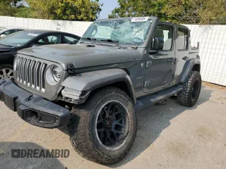 2020 Jeep Wrangler Unlimited Sahara with VIN 1C4HJXEM2LW337002, listed as a Copart auction lot 71056504 with 0 mi miles and Salvage Title. Bid and sale history available at carsss.com. Image 1.