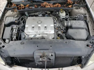 2003 Cadillac DeVille with VIN 1G6KD54Y03U206526, listed as a Copart auction lot 38023213 with 103,724 mi miles and Salvage Title. Bid and sale history available at carsss.com. Image 11.