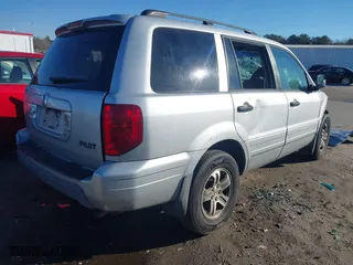 2004 Honda Pilot EX with VIN 2HKYF18464H512952, listed as a IAAI auction lot 41373720 with 306,406 mi miles. Bid and sale history available at carsss.com. Image 4.