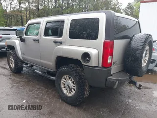 2006 Hummer H3 with VIN 5GTDN136168189138, listed as a IAAI auction lot 42012951 with 209,548 mi miles. Bid and sale history available at carsss.com. Image 3.