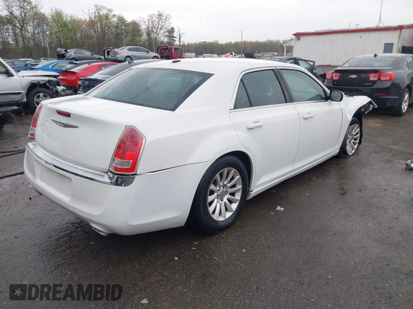 2014 Chrysler 300 with VIN 2C3CCAAG5EH128036, listed as a IAAI auction lot 41988327 with 153,809 mi miles. Bid and sale history available at carsss.com. Image 4.
