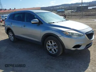 2015 Mazda CX-9 Sport with VIN JM3TB2BA6F0455539, listed as a IAAI auction lot 41839466 with 143,667 mi miles and . Bid and sale history available at carsss.com. Image 1.
