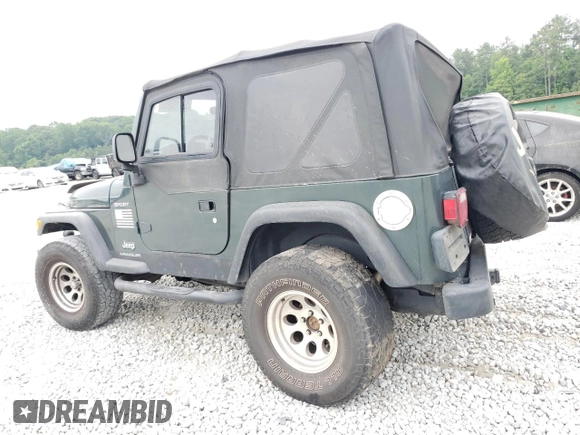 2003 Jeep Wrangler Sport with VIN 1J4FA49S03P330858, listed as a Copart auction lot 59519085 with Not provided miles and Salvage title. Bid and sale history available at DreamBid. Image 2.