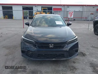 2022 Honda Civic Sport z VIN 2HGFE2F54NH560781, wystawiony jako IAAI lot #41321267 z przebiegiem 42 223 mil mil oraz . Historia ofert i sprzedaży dostępna na DreamBid. Obrazek 12.