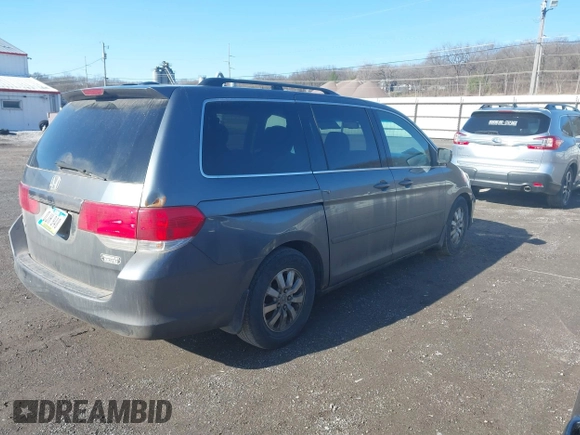 2010 Honda Odyssey EX-L with VIN 5FNRL3H68AB038541, listed as a IAAI auction lot 41813473 with 206,914 mi miles. Bid and sale history available at carsss.com. Image 4.