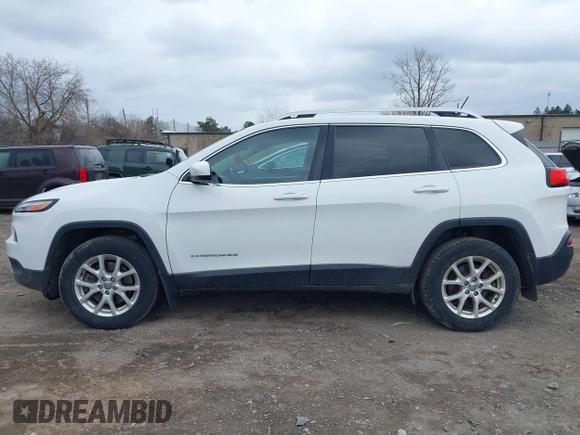 2017 Jeep Cherokee Latitude with VIN 1C4PJMCB3HW530794, listed as a IAAI auction lot 41854670 with 103,798 mi miles. Bid and sale history available at carsss.com. Image 14.