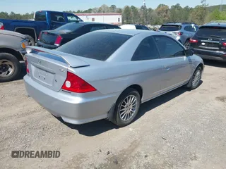 2005 Honda Civic Cpe LX with VIN 1HGEM22555L080708, listed as a IAAI auction lot 41884559 with 273,112 mi miles. Bid and sale history available at carsss.com. Image 4.