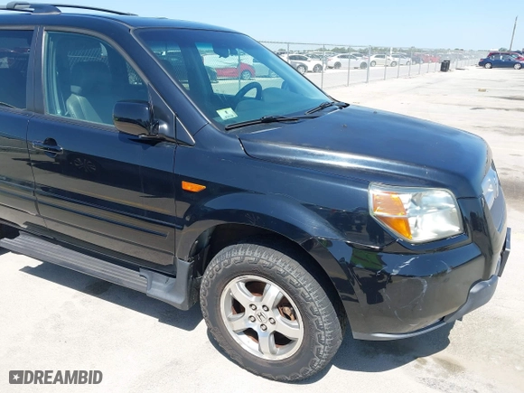 2006 Honda Pilot EX-L with VIN 2HKYF18566H554131, listed as a IAAI auction lot 42014554 with 187,765 mi miles. Bid and sale history available at carsss.com. Image 6.
