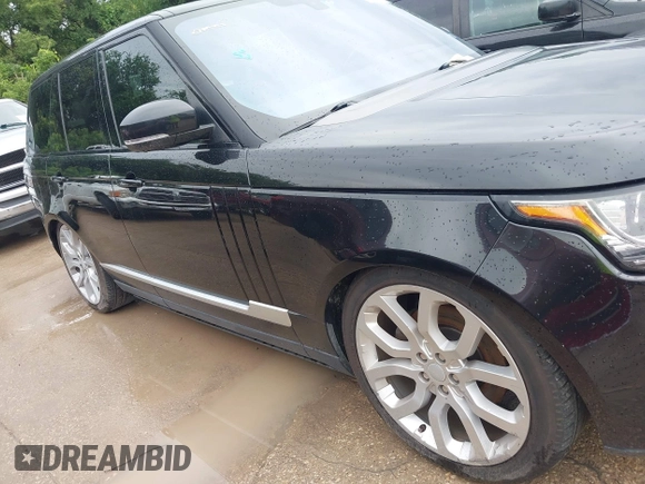 2015 Land Rover Range Rover HSE with VIN SALGS2VF0FA232420, listed as a IAAI auction lot 42482614 with 130,377 mi miles and . Bid and sale history available at DreamBid. Image 13.