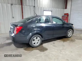 2014 Chevrolet Sonic LT z VIN 1G1JC5SH1E4118997, wystawiony jako Copart lot #70792334 z przebiegiem 166 691 mil mil oraz Szkoda całkowita • Salvage title. Historia ofert i sprzedaży dostępna na DreamBid. Obrazek 3.