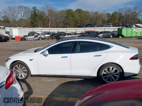 2014 Tesla Model S 60 with VIN 5YJSA1H13EFP62451, listed as a IAAI auction lot 41639068 with 88,000 mi miles and . Bid and sale history available at DreamBid. Image 14.