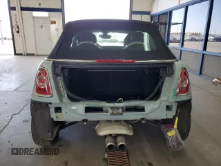 2012 MINI Convertible S с VIN WMWZP3C55CT249664, выставлен на аукционе Copart как лот 63120145 с пробегом 59 197 миль миль и Списание • Salvage title. История ставок и продаж доступна на DreamBid. Изображение 6.