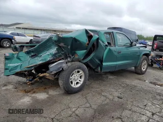 2004 Dodge Dakota SLT с VIN 1D7GL42K04S612274, выставлен на аукционе Copart как лот 57443075 с пробегом 258 513 миль миль и Списание • Salvage title. История ставок и продаж доступна на DreamBid. Изображение 3.