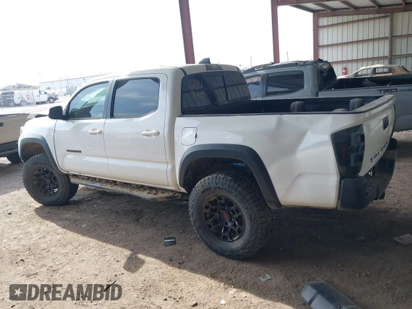 2021 Toyota Tacoma SR z VIN 3TMCZ5AN4MM373247, wystawiony jako IAAI lot #41982617 z przebiegiem 45 692 mil mil oraz . Historia ofert i sprzedaży dostępna na DreamBid. Obrazek 14.