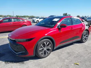 2024 Toyota Crown XLE with VIN JTDAAAAF0R3028242, listed as a IAAI auction lot 41673482 with 19,306 mi miles and . Bid and sale history available at DreamBid. Image 2.