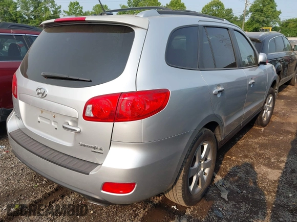 2009 Hyundai Santa Fe SE z VIN 5NMSH13E09H255761, wystawiony jako IAAI lot #42419450 z przebiegiem 252 937 mil mil oraz . Historia ofert i sprzedaży dostępna na DreamBid. Obrazek 4.