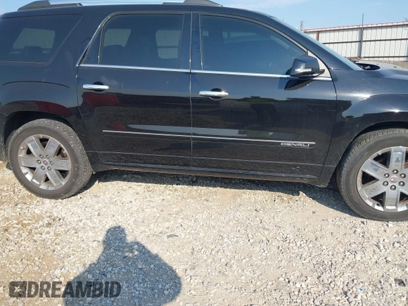 2016 GMC Acadia Denali with VIN 1GKKRTKD0GJ349149, listed as a IAAI auction lot 40554328 with 111,675 mi miles. Bid and sale history available at carsss.com. Image 13.