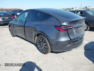 2022 Tesla Model Y Performance with VIN 7SAYGDEF6NF540094, listed as a IAAI auction lot 41786865 with 28,356 mi miles and . Bid and sale history available at DreamBid. Image 3.