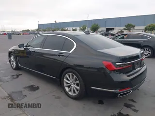 2022 BMW 7 Series 740i with VIN WBA7T2C0XNCJ31291, listed as a IAAI auction lot 40623307 with 98,877 mi miles. Bid and sale history available at carsss.com. Image 3.
