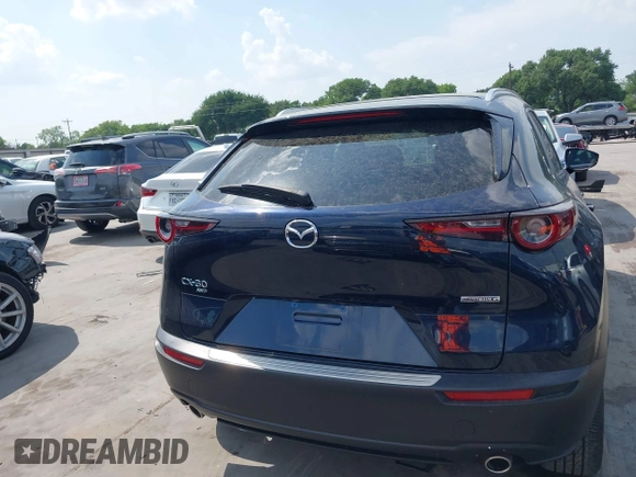2023 Mazda CX-30 S Carbon Edition with VIN 3MVDMBCM4PM542160, listed as a IAAI auction lot 42175395 with 11,340 mi miles and . Bid and sale history available at DreamBid. Image 16.