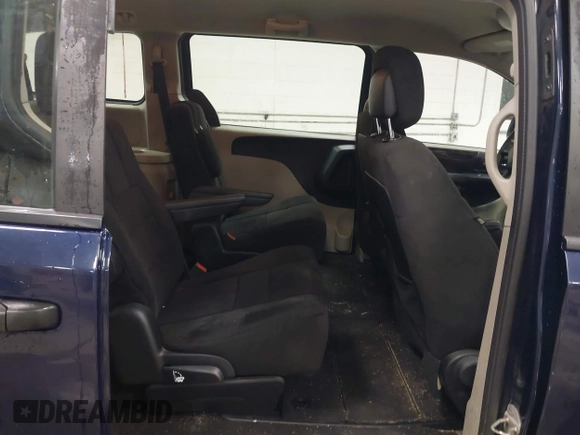 2012 Dodge Grand Caravan SE with VIN 2C4RDGBG8CR367236, listed as a IAAI auction lot 40041863 with 166,555 mi miles and . Bid and sale history available at DreamBid. Image 8.