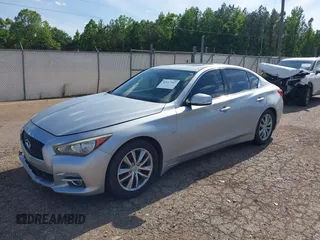 2015 Infiniti Q50 Premium z VIN JN1BV7AP1FM346254, wystawiony jako IAAI lot #42147947 z przebiegiem 147 737 mil mil oraz . Historia ofert i sprzedaży dostępna na DreamBid. Obrazek 2.