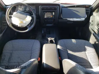 2000 Jeep Cherokee with VIN 1J4FF48S7YL237109, listed as a Copart auction lot 58420385 with 191,786 mi miles and Non repairable. Bid and sale history available at DreamBid. Image 8.