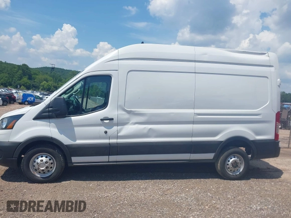 2023 Ford Transit Cargo with VIN 1FTBR2X81PKB38408, listed as a IAAI auction lot 42608271 with 28,384 mi miles and . Bid and sale history available at DreamBid. Image 14.