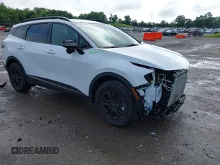 2023 Kia Sportage X-Pro Prestige z VIN 5XYK7CAF6PG135612, wystawiony jako IAAI lot #42244280 z przebiegiem 7 084 mil mil oraz . Historia ofert i sprzedaży dostępna na DreamBid. Obrazek 1.