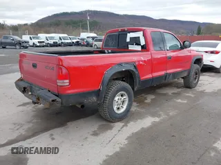 1998 Dodge Dakota SLT with VIN 1B7GG22Y1WS519712, listed as a IAAI auction lot 41913541 with 232,892 mi miles. Bid and sale history available at carsss.com. Image 4.
