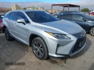 2018 Lexus RX 450hL Premium z VIN JTJDGKCA4J2001622, wystawiony jako IAAI lot #42779010 z przebiegiem 71 969 mil mil oraz . Historia ofert i sprzedaży dostępna na DreamBid. Obrazek 1.