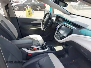 2020 Chevrolet Bolt EV Premier z VIN 1G1FZ6S05L4114842, wystawiony jako IAAI lot #42157277 z przebiegiem 57 705 mil mil oraz . Historia ofert i sprzedaży dostępna na DreamBid. Obrazek 5.