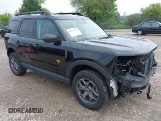 2022 Ford Bronco Sport Badlands z VIN 3FMCR9D90NRD81822, wystawiony jako IAAI lot #42432192 z przebiegiem 26 088 mil mil oraz . Historia ofert i sprzedaży dostępna na DreamBid. Obrazek 1.