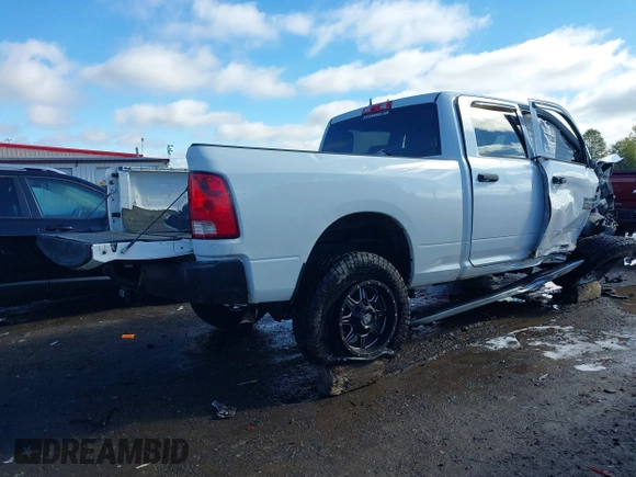2014 Ram 2500 Tradesman z VIN 3C6TR5CT1EG234972, wystawiony jako IAAI lot #40605313 z przebiegiem 170 001 mil mil oraz . Historia ofert i sprzedaży dostępna na DreamBid. Obrazek 4.
