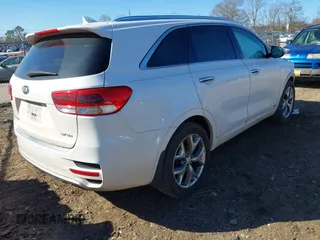 2016 Kia Sorento SX with VIN 5XYPKDA55GG174984, listed as a IAAI auction lot 41216303 with 142,875 mi miles. Bid and sale history available at carsss.com. Image 4.