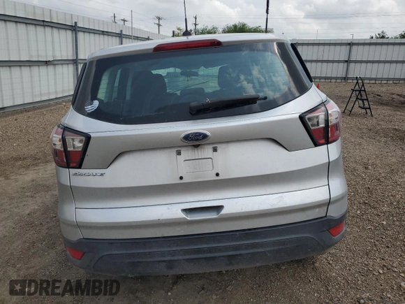2018 Ford Escape S с VIN 1FMCU0F76JUB83089, выставлен на аукционе Copart как лот 54172305 с пробегом 88 144 миль миль и Списание • Salvage title. История ставок и продаж доступна на DreamBid. Изображение 6.