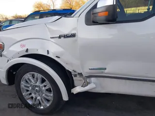 2014 Ford F-150 XL with VIN 1FTFW1ET7EFA61769, listed as a IAAI auction lot 41669656 with 119,198 mi miles and . Bid and sale history available at DreamBid. Image 6.