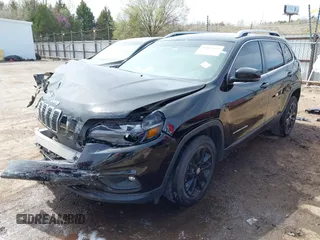 2021 Jeep Cherokee Latitude Lux with VIN 1C4PJLMX4MD107152, listed as a IAAI auction lot 41857619 with 51,686 mi miles. Bid and sale history available at carsss.com. Image 18.